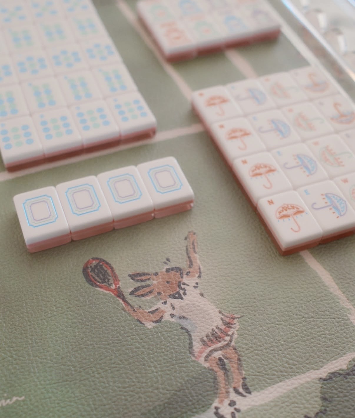 Mahjong tiles racked and ready for class